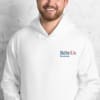 a man in a white Best Of Us Investors Hoodie