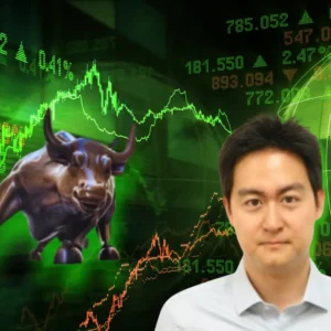 Drew Huh in standing in front of a stock chart with a bull on it