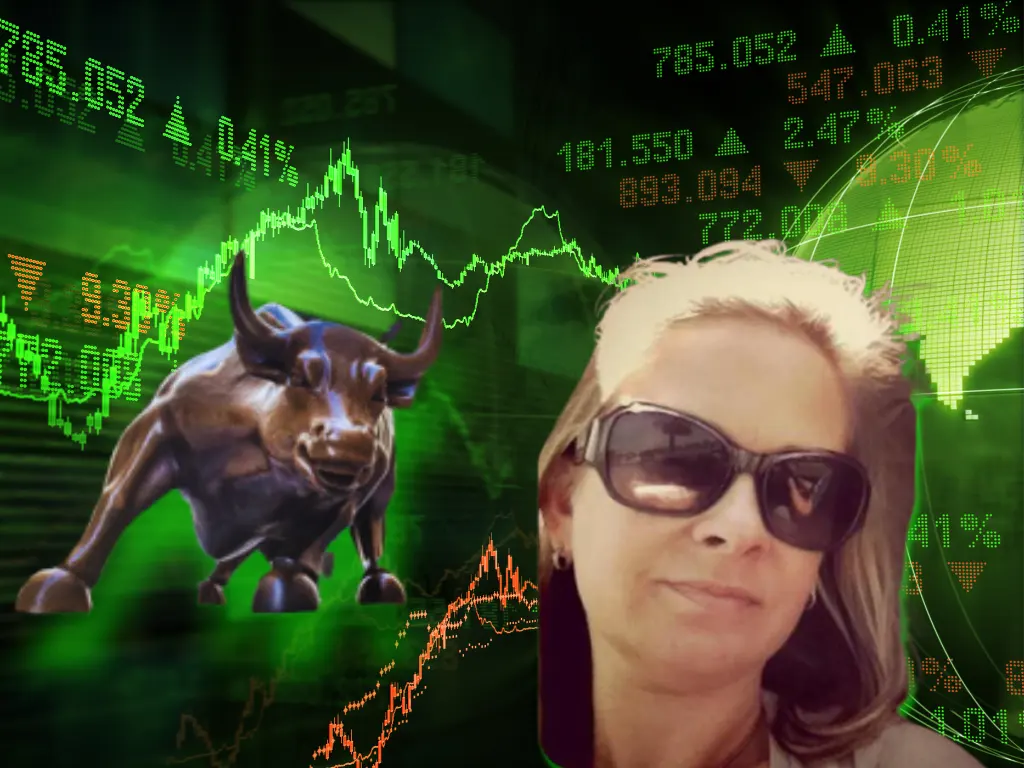Shannon Grinkmeyer-Hamer in sunglasses is standing in front of a stock market background